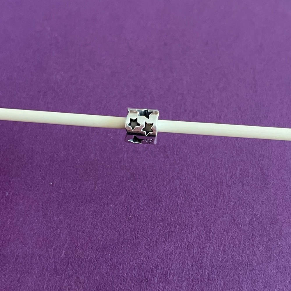 Pandora Retired Multi Star Cut Out charm.